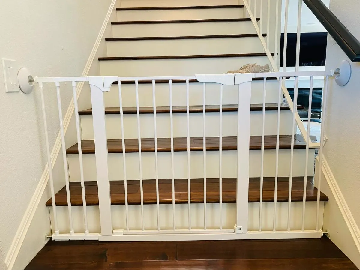 Pet Gate Separating Hallway For Cat A sturdy pet gate installed in a hallway to keep a cat safely separated from a dog.